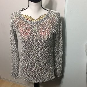 Gray and white long sleeve shirt